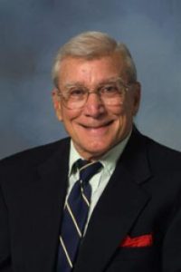 Headshot photo of Professor Ray Klitzke wearing a suit and tie.