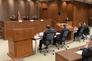 Picture of courtroom with judges on the bench and student advocates seated at tables