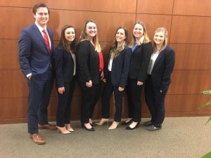 six students standing in law school