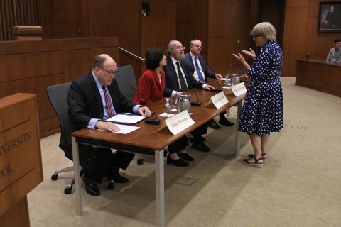 Professor Kearney speaking with panel members